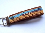 Schlüsselanhänger Agility karamell-hellblau - ca. 11,5 cm zzgl. Metallöse und Schlüsselring