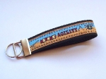 Schlüsselanhänger Agility karamell-hellblau mit schwarzem Gurtband - ca. 11,5 cm zzgl. Metallöse und Schlüsselring