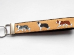Border Collie beige (Gurtband schwarz) - Länge ca. 15 cm zzgl. Metallöse und Schlüsselring
